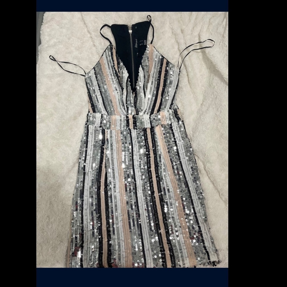 Sequin dress with ribcage cut out